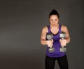 Fit woman doing weight training Royalty Free Stock Photo