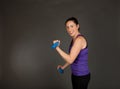Fit woman doing weight training Royalty Free Stock Photo