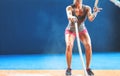 Fit woman exercising with battle ropes in the gym - Female athlete training workout session Royalty Free Stock Photo