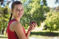 Fit woman holding bag of healthy groceries Royalty Free Stock Photo