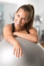 Fit Woman Holding a Pilates Ball