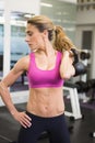 Fit woman lifting kettle bell in gym Royalty Free Stock Photo