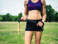 Fit woman in park with jump rope Royalty Free Stock Photo