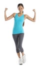 Fit Woman In Sports Clothing Flexing Muscles