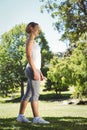 Fit woman walking in the park Royalty Free Stock Photo