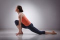 Fit yogini woman practices yoga asana