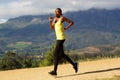 Fit young african woman jogging outdoors in nature Royalty Free Stock Photo
