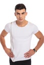 Fit young casual man standing with hands on waist Royalty Free Stock Photo