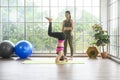 Fit young friend women doing yoga and meditation at home, sport and healthy lifestyle concept Royalty Free Stock Photo