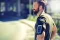 Fit young man smiling before an urban run Royalty Free Stock Photo