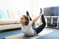 Woman doing bow pose yoga Royalty Free Stock Photo