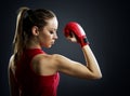 Fit, young woman boxer back