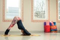 Fit young woman doing yoga indoor Royalty Free Stock Photo