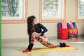 Fit young woman doing yoga indoor Royalty Free Stock Photo