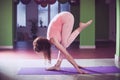 Fit young woman doing yoga indoor Royalty Free Stock Photo