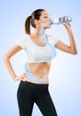 Fit young woman drinking water Royalty Free Stock Photo