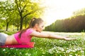 Fit young woman exercising outdoors Royalty Free Stock Photo