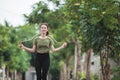 Fit young woman with jump rope in a park Royalty Free Stock Photo