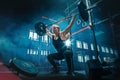 Fit young woman lifting barbells working out in a gym Royalty Free Stock Photo