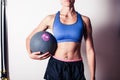 Fit young woman with medicine ball Royalty Free Stock Photo