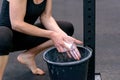 Fit young woman chalking her hands Royalty Free Stock Photo