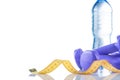 Fitnes symbols - blue dumbbells, a bottle of water and a towel. The concept of a healthy lifestyle