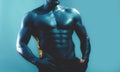 Sexy muscular male torso six packs on wet body of athletic man training with bare chest and strong biceps on hands Royalty Free Stock Photo