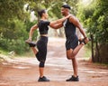 Fitness, active and healthy couple stretching, exercising or training together outside park. Sporty and supportive man Royalty Free Stock Photo