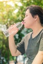 Fitness asian white fatty woman with drinking water