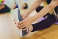 Fitness athletes foot close-up. Healthy lifestyle and sport concepts. Woman in fashionable sportswear is doing exercise. Royalty Free Stock Photo