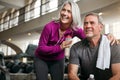 Fitness is beneficial to all ages. a mature couple working out together at the gym. Royalty Free Stock Photo