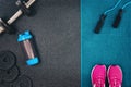 Fitness or bodybuilding background. Dumbbells on gym floor, top view Royalty Free Stock Photo