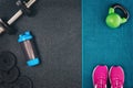 Fitness or bodybuilding background. Dumbbells on gym floor, top view Royalty Free Stock Photo