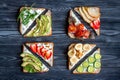 Fitness breskfast with homemade sandwiches dark table background top view Royalty Free Stock Photo