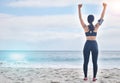 Fitness, celebration and woman with arms up at beach, mockup and winning achievement in nature. Ocean, goals and Royalty Free Stock Photo