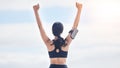 Fitness, celebration and woman with arms up in cloudy sky, mockup and winning achievement in nature. Ocean, goals and Royalty Free Stock Photo