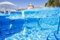 Fitness class aqua aerobics on  bikes in swimming pool Royalty Free Stock Photo