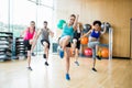 Fitness class exercising in the studio Royalty Free Stock Photo