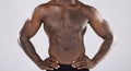 Fitness, closeup and muscular black man, health and wellness with guy on grey studio background. Nigerian male