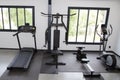 Fitness club with different machines in the gym equipment for training exercise