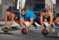 Fitness coach doing workout with girls Royalty Free Stock Photo