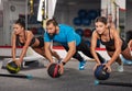 Fitness coach doing workout with girls Royalty Free Stock Photo