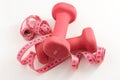 fitness concept dumbbell and measure ribbon tape