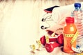 Fitness concept with dumbbells, fruits juice and water bottle Royalty Free Stock Photo