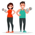 Fitness couple. Man and woman dressed in sportswear are doing ex