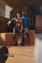 Fitness couple in sport clothes after workout at gym portrait Royalty Free Stock Photo