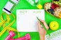 Fitness diary for planning healthy fitness lifestyle Royalty Free Stock Photo