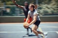 Fitness, diversity and friends in action on a basketball court training, exercise and playing together in summer. Active Royalty Free Stock Photo