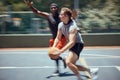 Fitness, diversity and friends in action on a basketball court training, exercise and playing together in summer. Active Royalty Free Stock Photo