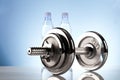 Fitness dumbbell with mineral water